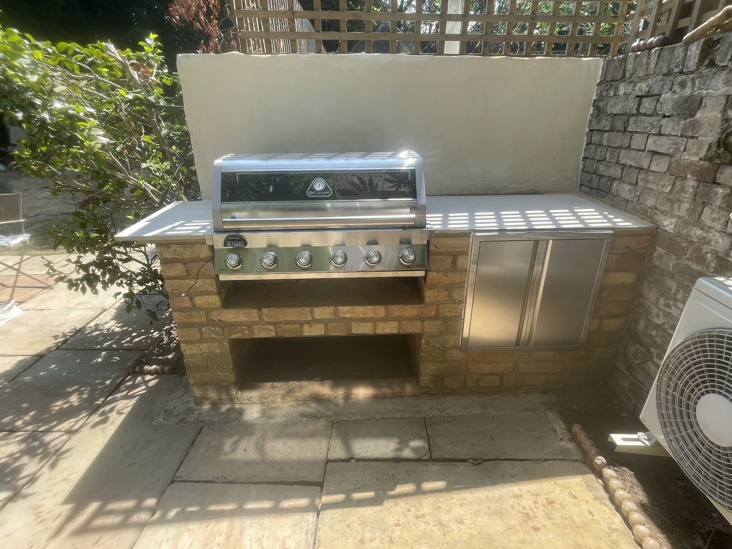 Bespoke brick outdoor kitchen and BBQ station